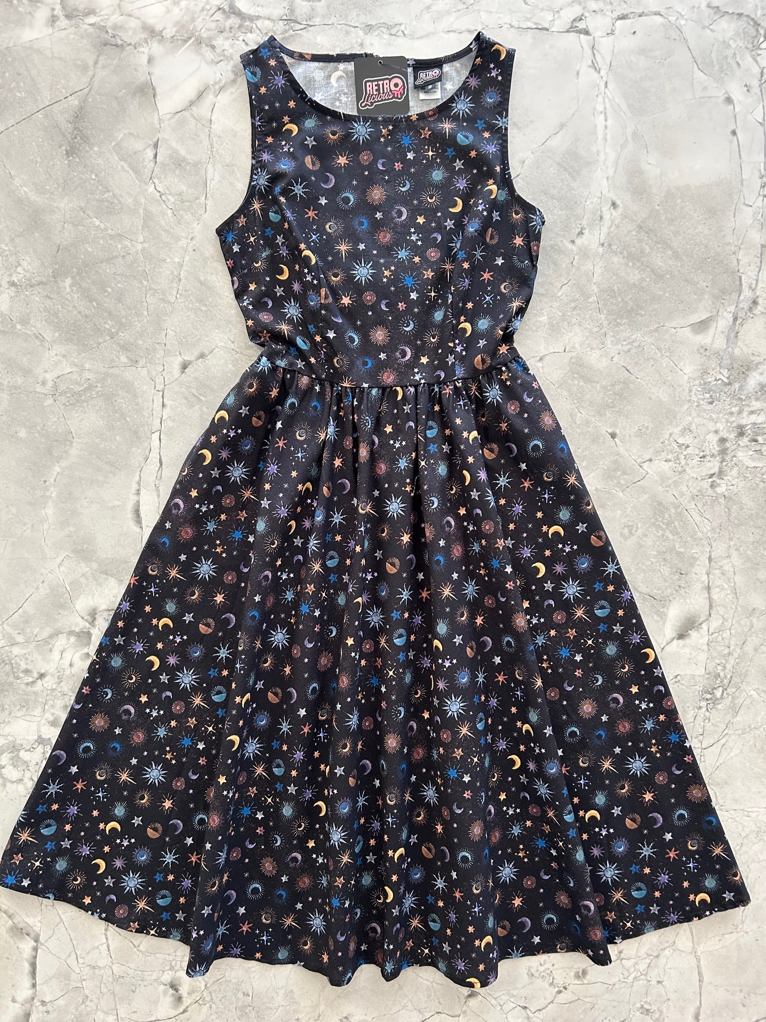 flatlay of celestial midi dress