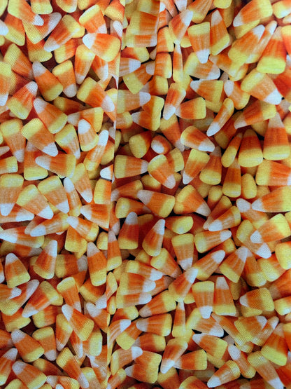 close up of fabric showing all over candy corn print