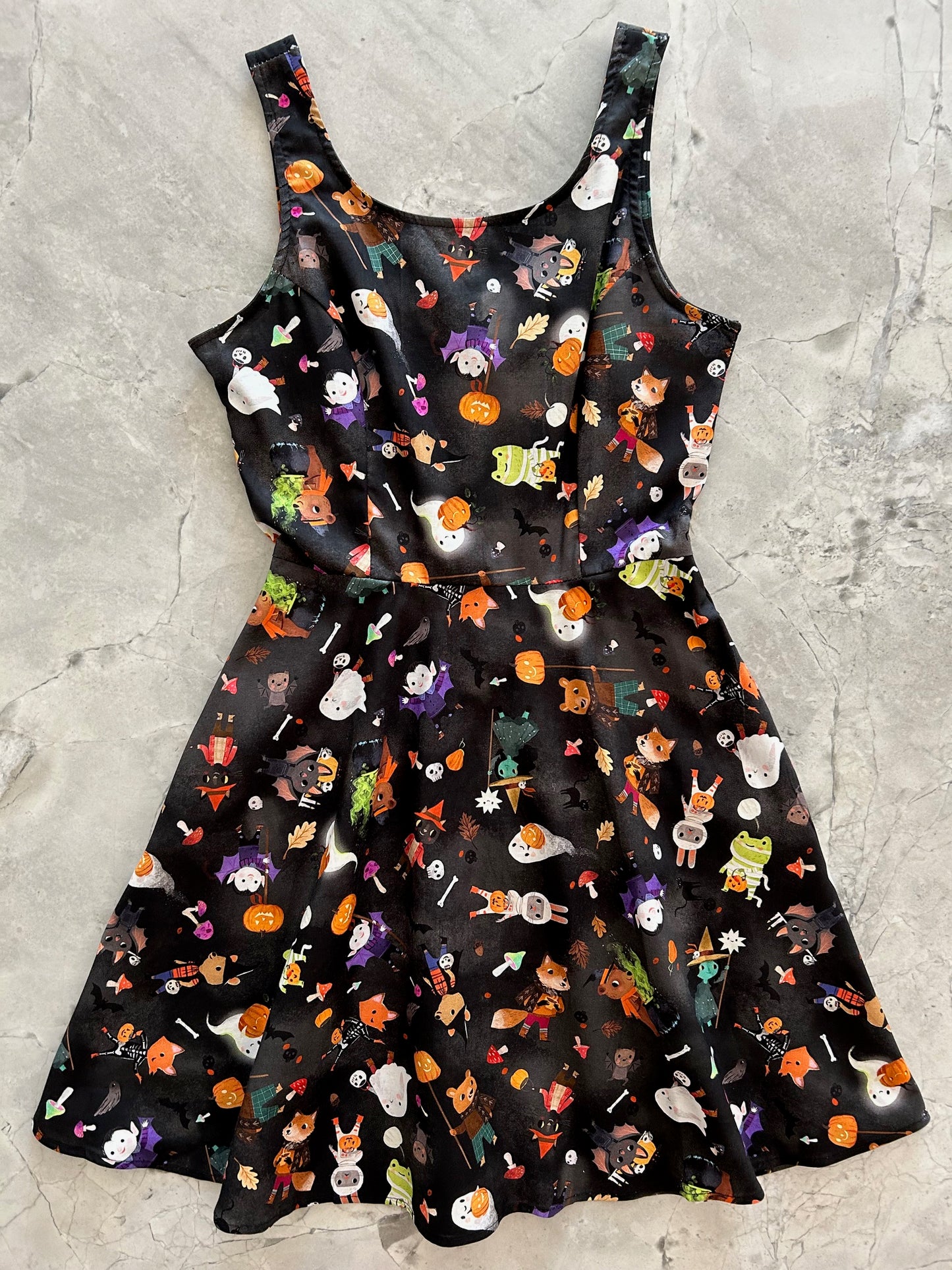 flatlay of ghoulish skater dress