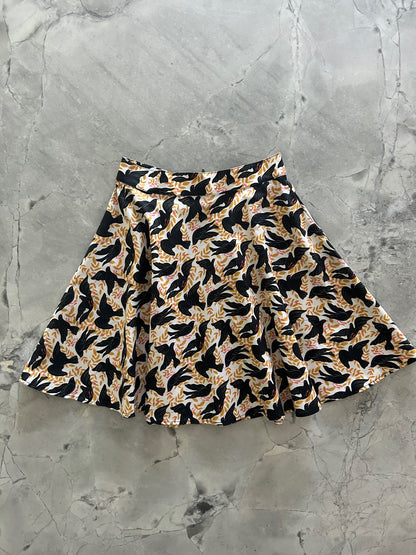 flatlay of birds skater skirt