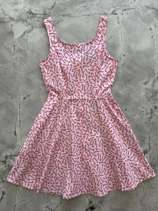 flatlay of candy cane skater dress