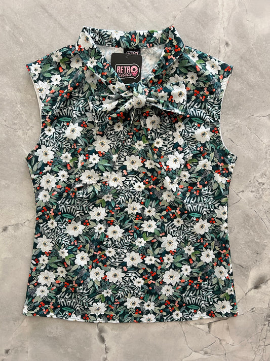 flatlay of winter floral bow top