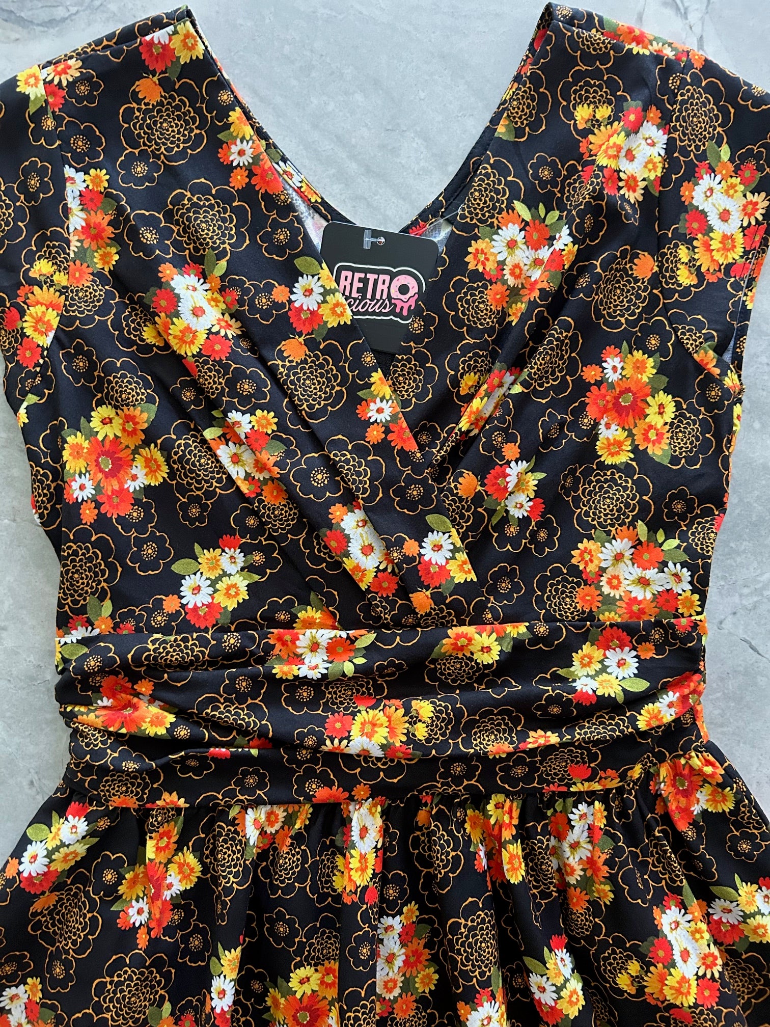 flatlay of autumn floral greta dress bodice