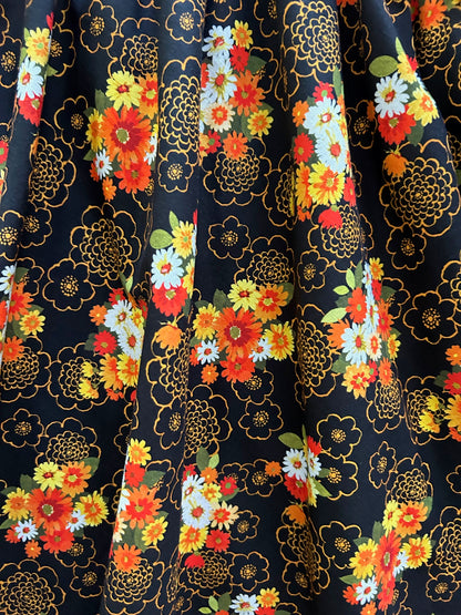 close up showing the print of autumn floral greta dress