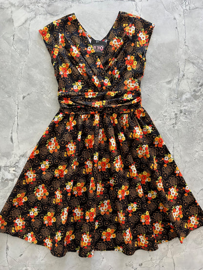 flatlay of autumn floral greta dress