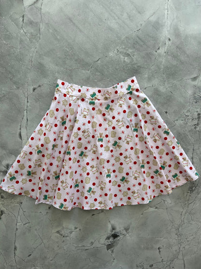 flatlay of gingerbread kitties skater skirt