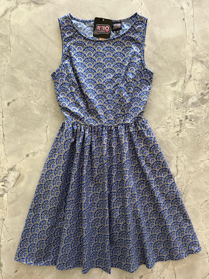 flatlay of blue and gold florentine vintage dress