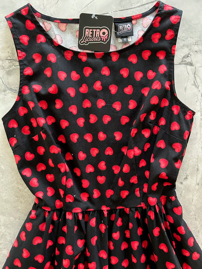 flatlay of bodice of hearts midi dress