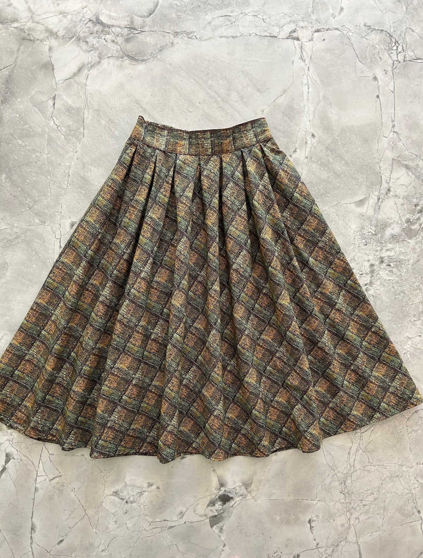 flatlay of green plaid doris skirt