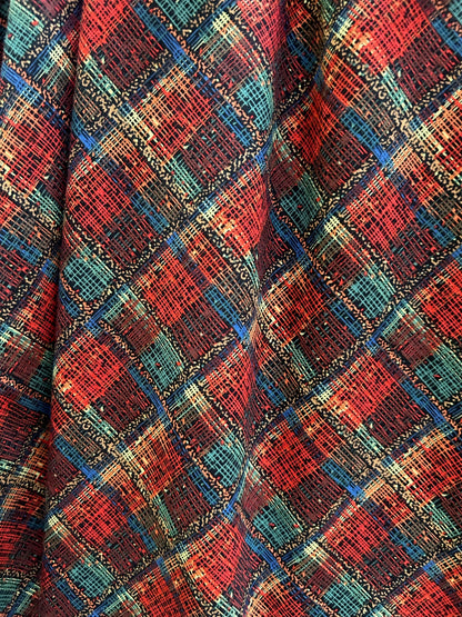 flatlay of close up of plaid fabric for holiday greta dress