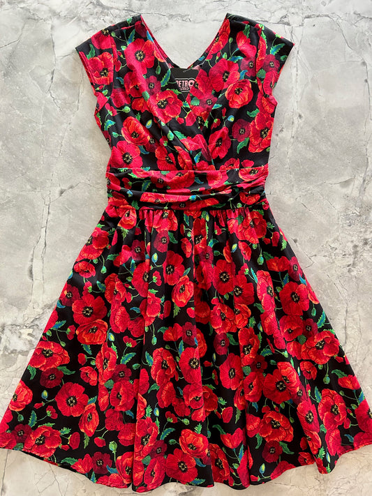 flatlay of floral poppy greta dress