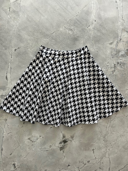 flatlay of houndstooth cats skater skirt