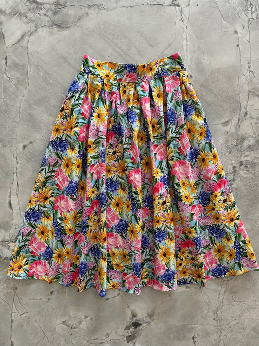 flatlay of floral skirt