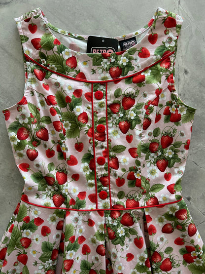 flatlay of elizabeth dress in strawberries close up