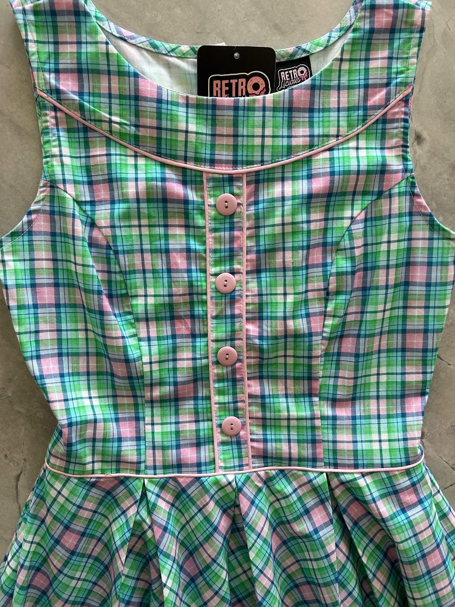 flatlay of plaid elizabeth dress close up of bodice