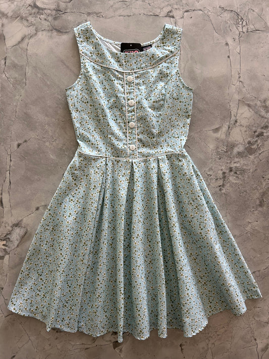 flatlay of elizabeth dress in petite floral