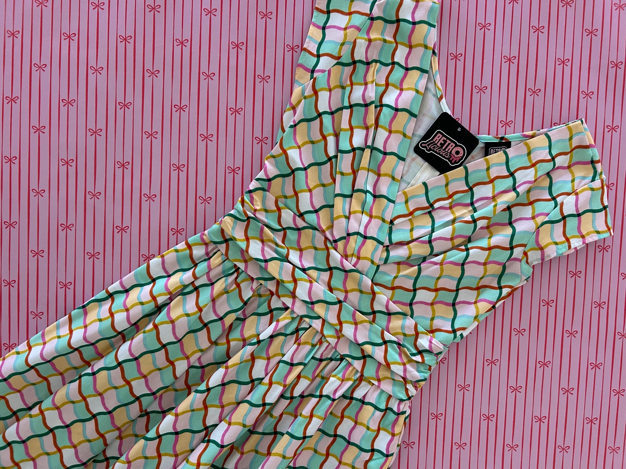 flatlay_of_squiggly_greta_dress